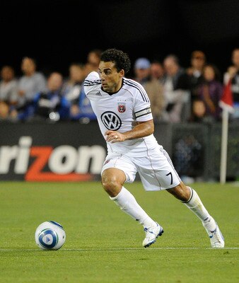 SANTA CLARA, CA - JULY 30: Dwayne De Rosario #7 of D.C. United dribbles the ball in front of Tim Ward #20 of the San Jose Earthquakes in the second half during an MLS soccer game at Buck Shaw Stadium on July 30, 2011 in Santa Clara, California. D.C. Unite