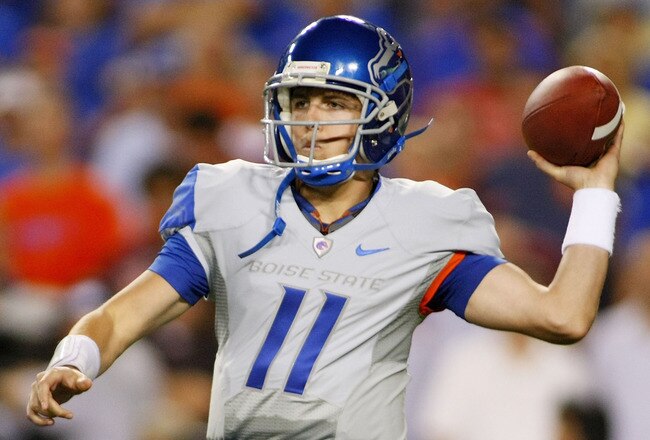 LANDOVER, MD - SEPTEMBER 06:  Quarterback Kellen Moore #11 of the Boise State Broncos passes against the Virginia Tech Hokies at FedExField on September 6, 2010 in Landover, Maryland.  (Photo by Geoff Burke/Getty Images)