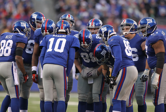 EAST RUTHERFORD, NJ - DECEMBER 19:  Eli Manning #10 of the New York Giantscalls the huddle against  the Philadelphia Eagles during their game on December 19, 2010 at The New Meadowlands Stadium in East Rutherford, New Jersey.  (Photo by Al Bello/Getty Ima