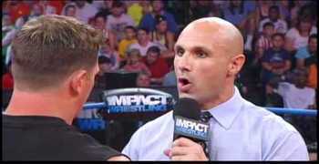 Img_2255_aj-styles-and-christopher-daniels-sign-the-contract_display_image_display_image