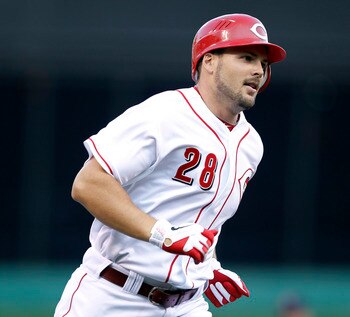 CINCINNATI, OH - JULY 15: Chris Heisey #28 of the Cincinnati Reds rounds the bases after hitting a home run in the first inning against the St. Louis Cardinals at Great American Ball Park on July 15, 2011 in Cincinnati, Ohio. (Photo by Joe Robbins/Getty I