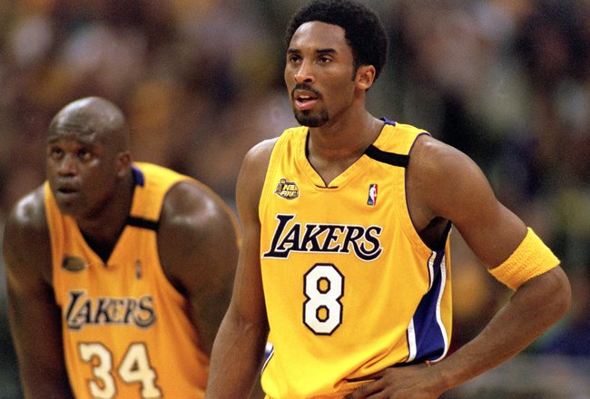 19 Jun 2000:  Kobe Bryant #8 and Shaquille O''Neal #34 of the Los Angeles Lakers looking on during the NBA Finals Game 6 against the Indiana Pacers at the Staples Center in Los Angeles, California.  The Lakers defeated the Pacers in 116-111.  NOTE TO USER