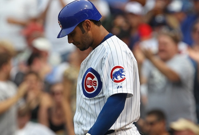CHICAGO, IL - JULY 01: Carlos Pena #22 of the Chicago Cubs walks away from home plate after striking out against the Chicago White Sox at Wrigley Field on July 1, 2011 in Chicago, Illinois. The White Sox defeated the Cubs 6-4. (Photo by Jonathan Daniel/Ge