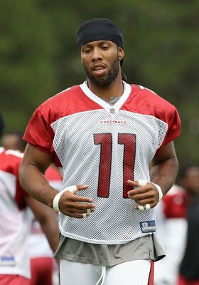 FLAGSTAFF, AZ - JULY 30:  Wide receiver Larry Fitzgerald #11 of the Arizona Cardinals practices in the team training camp at Northern Arizona University on July 30, 2011 in Flagstaff, Arizona.  (Photo by Christian Petersen/Getty Images)