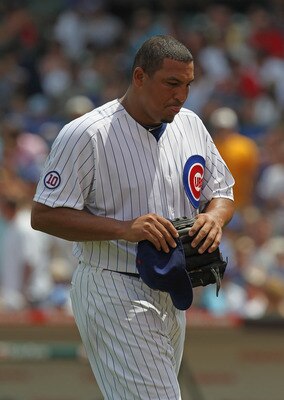 CHICAGO, IL - JULY 16:  Starting pitcher Carlos Zambrano #38 of the Chicago Cubs walks to the dugout after being taken out of a game against the Florida Marlins at Wrigley Field on July 16, 2011 in Chicago, Illlinois.  (Photo by Jonathan Daniel/Getty Imag