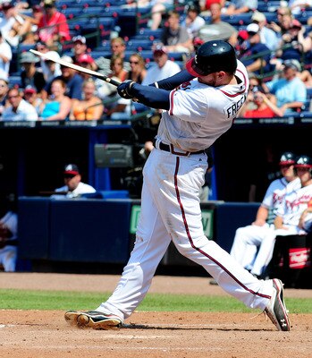 ATLANTA - JULY 7: Freddie Freeman #5 of the Atlanta Braves breaks his bat while hitting against the Colorado Rockies at Turner Field on July 7, 2011 in Atlanta, Georgia. (Photo by Scott Cunningham/Getty Images)