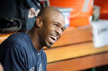 WASHINGTON, DC - AUGUST 01:  Michael Bourn #24 of the Atlanta Braves sits in the dugout before the game against the Washington Nationals at Nationals Park on August 1, 2011 in Washington, DC.  (Photo by Greg Fiume/Getty Images)