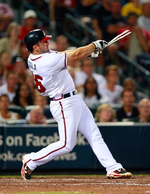 ATLANTA, GA - JULY 29:  Dan Uggla #26 of the Atlanta Braves bats against the Florida Marlins at Turner Field on July 29, 2011 in Atlanta, Georgia.  (Photo by Kevin C. Cox/Getty Images)