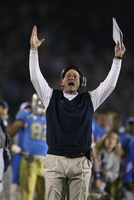 PASADENA, CA - DECEMBER 04:  UCLA Bruins head coach Rick Neuheisel yells from the sideline against the USC Trojans at the Rose Bowl on December 4, 2010 in Pasadena, California.  USC defeated UCLA 28-14.  (Photo by Jeff Gross/Getty Images)
