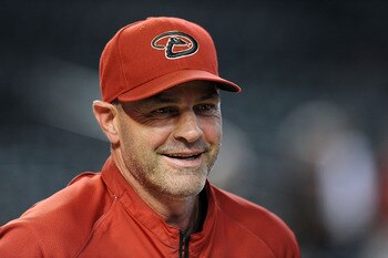 PHOENIX - JUNE 16:  Manager Kirk Gibson #23 of the Arizona Diamondbacks smiles as he walks out to the field during batting practice prior to a game against the San Francisco Giants at Chase Field on June 16, 2011 in Phoenix, Arizona.  (Photo by Norm Hall/