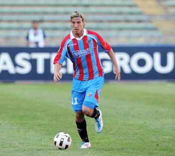 BARI, ITALY - APRIL 10:  Maxi Lopez of Catania in action during the Serie A match between AS Bari and Catania Calcio at Stadio San Nicola on April 10, 2011 in Bari, Italy.  (Photo by Giuseppe Bellini/Getty Images)