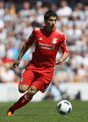 LIVERPOOL, ENGLAND - MAY 01:  Luis Suarez of Liverpool in action during the Barclays Premier League match between Liverpool  and Newcastle United at Anfield on May 1, 2011 in Liverpool, England.  (Photo by Clive Brunskill/Getty Images)