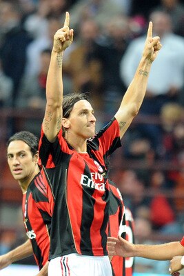 MILAN, ITALY - SEPTEMBER 25:  Zlatan Ibrahimovic of Milan celebrates the opening goal during the Serie A match between AC Milan and Genoa CFC at Stadio Giuseppe Meazza on September 25, 2010 in Milan, Italy.  (Photo by Tullio M. Puglia/Getty Images)