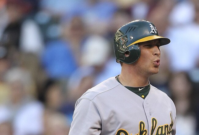 SEATTLE - AUGUST 01:  Ryan Sweeney #15 of the Oakland Athletics reacts after being called out on strikes with the bases loaded in the first inning against the Seattle Mariners at Safeco Field on August 1, 2011 in Seattle, Washington. (Photo by Otto Greule