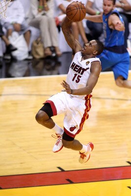MIAMI, FL - JUNE 12:  Mario Chalmers #15 of the Miami Heat drives for a shot attempt against the Dallas Mavericks in Game Six of the 2011 NBA Finals at American Airlines Arena on June 12, 2011 in Miami, Florida. NOTE TO USER: User expressly acknowledges a