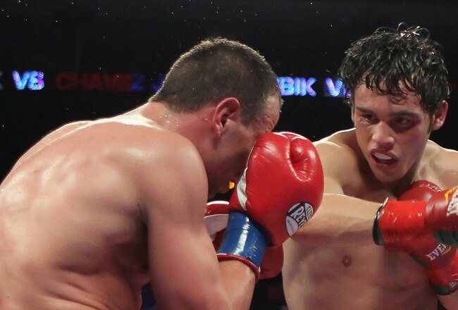 LOS ANGELES, CA - JUNE 04:  Julio Cesar Chavez Jr. (R) of Mexico throws a punch at Sebastian Zbik of Germany during their WBC World Middleweight Title bout at Staples Center on June 4, 2011 in Los Angeles, California.  (Photo by Jeff Gross/Getty Images)