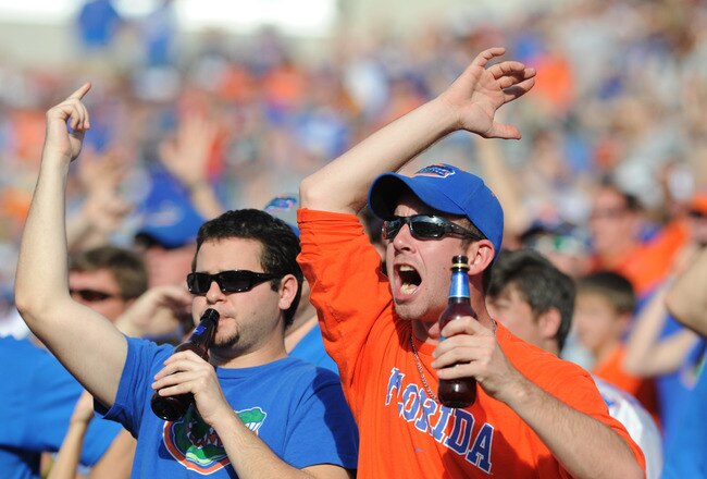 TAMPA, FL - JANUARY 1:  Fans of the Florida Gators cheer play  against the Penn State Nittany Lions January 1, 2011 in the 25th Outback Bowl at Raymond James Stadium in Tampa, Florida.  (Photo by Al Messerschmidt/Getty Images)