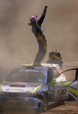 CARSON, CA - AUGUST 03:  Gold medal winner Travis Pastrana celebrates after winning the Rally Car race during the summer X Games 14 at Home Depot Center on August 3, 2008 in Carson, California.  (Photo by Christian Petersen/Getty Images)