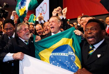 COPENHAGEN, DENMARK - OCTOBER 2: Brazil's President Luiz Inacio Lula da Silva, left, Rio 2016 bid President Carlos Arthur Nuzman, center, and Brazilian soccer great Pele, right, celebrate with their delegation after it was announced that Rio de Janeiro ha