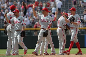DENVER, CO - AUGUST 03:  The Philadelphia Phillies celebrate their 8-6 win over the Colorado Rockies at Coors Field on August 3, 2011 in Denver, Colorado.  (Photo by Doug Pensinger/Getty Images)