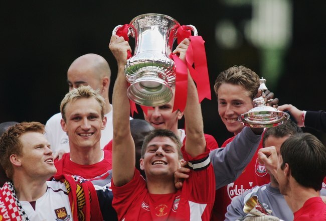 CARDIFF, UNITED KINGDOM - MAY 13:  Steven Gerrard, the Liverpool captain, lifts the trophy after the FA Cup Final match between Liverpool and West Ham United at the Millennium Stadium on May 13, 2006 in Cardiff, Wales.  (Photo by Ben Radford/Getty Images)