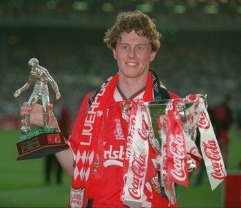 2 APR 1995:  STEVE MCMANAMAN OF LIVERPOOL HOLDS THE COCA COLA CUP TROPHY IN HIS LEFT HAND AND THE MAN OF THE MATCH TROPHY IN HIS RIGHT HAND AFTER LIVERPOOL BEAT BOLTON WANDERERS 2-1 TO WIN THE 1995 COCA COLA CUP FINAL AT WEMBLEY IN LONDON, ENGLAND. Mandat