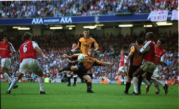 12 May 2001:  Michael Owen scoring the first goal for Liverpool during the AXA sponsored 2001 FA Cup Final between Arsenal v Liverpool at the Millennium Stadium, Cardiff. Mandatory Credit: Ben Radford/ALLSPORT