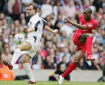 CARDIFF, UNITED KINGDOM - MAY 13:  (L-R) Carl Fletcher of West Ham United and Djibril Cisse of Liverpool during the FA Cup Final match between Liverpool and West Ham United at the Millennium Stadium on May 13, 2006 in Cardiff, Wales.  (Photo by Phil Cole/