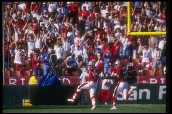 25 Sep 1994:  Defensive back Deion Sanders of the San Francisco 49ers returns an interception for a touchdown during a game against the New Orleans Saints at Candlestick Park in San Francisco, California.  The 49ers won the game, 24-13. Mandatory Credit: