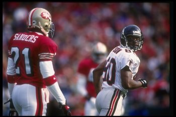 4 Dec 1994:  Wide receiver Andre Rison of the Atlanta Falcons (right) moves away from San Francisco 49ers defensive back Deion Sanders during a game at Candlestick Park in San Francisco, California.  The 49ers won the game, 50-14. Mandatory Credit: Otto G