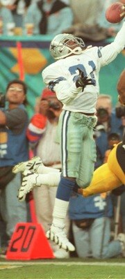 28 Jan 1996:  Cornerback Deion Sanders #21 of the Dallas Cowboys breaks up a pass intended for wide receiver Yancey Thigpen of the Pittsburgh Steelers during the Cowboys versus Steelers Super Bowl XXX game at Sun Devil Stadium in Tempe, Arizona.  The Cowb