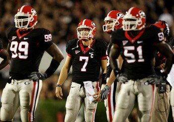 ATHENS, GA - SEPTEMBER 27:  Quarterback Matthew Stafford #7 of the Georgia Bulldogs and teammates look up at the instant replay after a score by the Alabama Crimson Tide at Sanford Stadium on September 27, 2008 in Athens, Georgia.  (Photo by Doug Benc/Get