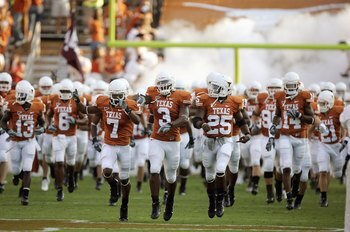 AUSTIN, TX - SEPTEMBER 22: The Texas Longhorns enter the field before the game against the Rice Owls on September 22, 2007 at Darrell K Royal-Texas Memorial Stadium in Austin, Texas.  Texas won 58-14.  (Photo by Brian Bahr/Getty Images)