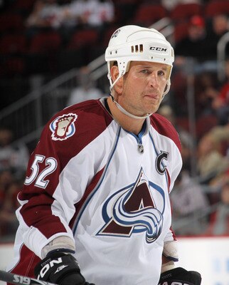 NEWARK, NJ - OCTOBER 15:  Adam Foote #52 of the Colorado Avalanche skates against the New Jersey Devils at the Prudential Center on October 15, 2010 in Newark, New Jersey.  (Photo by Bruce Bennett/Getty Images)
