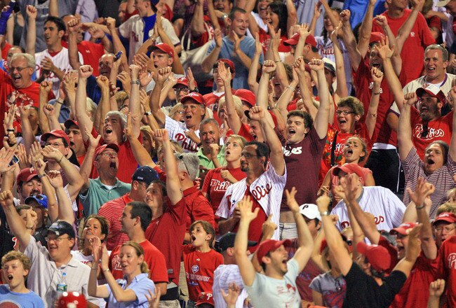 PHILADELPHIA - JUNE 10: Philadelphia Phillies fans cheer for Placido Polanco's grand slam home run during a game against the Chicago Cubs at Citizens Bank Park on June 10, 2011 in Philadelphia, Pennsylvania. The Phillies won 7-5. (Photo by Hunter Martin/G