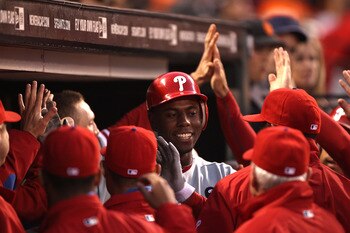 SAN FRANCISCO, CA - AUGUST 05:  John Mayberry Jr. #15 of the Philadelphia Phillies celebrates after hitting a two run home run in the fourth inning against the San Francisco Giants at AT&T Park on August 5, 2011 in San Francisco, California.  (Photo by Je