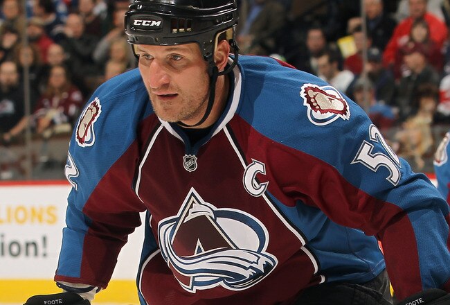 DENVER - DECEMBER 27:  Adam Foote #52 of the Colorado Avalanche skates against the Detroit Red Wings at the Pepsi Center on December 27, 2010 in Denver, Colorado. The Red Wings defeated the Avalanche 4-3 in overtime.  (Photo by Doug Pensinger/Getty Images