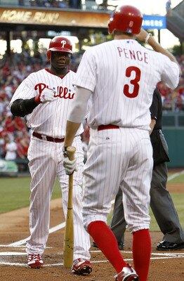 PHILADELPHIA, PA- JULY 30:  Hunter Pence #3 greets Ryan Howard #6 of the Philadelphia Phillies on his solo home run against the Pittsburgh Pirates at Citizens Bank Park on July 30, 2011 in Philadelphia, Pennsylvania.  (Photo by Jeff Zelevansky/Getty Image