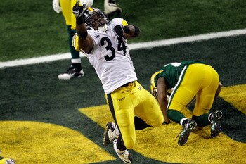 ARLINGTON, TX - FEBRUARY 06:  Rashard Mendenhall #34 of the Pittsburgh Steelers celebrates after running for an eight yard touchdown against the Green Bay Packers in the third quarter during Super Bowl XLV at Cowboys Stadium on February 6, 2011 in Arlingt