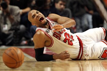CHICAGO, IL - MAY 26:  Taj Gibson #22 of the Chicago Bulls reacts against the Miami Heat in Game Five of the Eastern Conference Finals during the 2011 NBA Playoffs on May 26, 2011 at the United Center in Chicago, Illinois. NOTE TO USER: User expressly ack