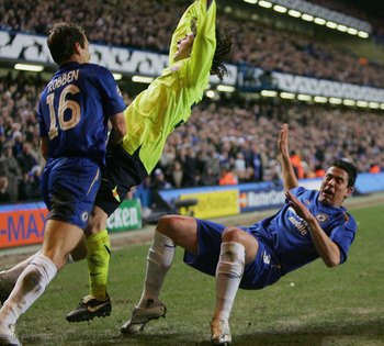 LONDON - FEBRUARY 22: Asier Del Horno of Chelsea (R) brings down Lionel Messi of Barcelona and is sent off during the UEFA Champions League Round of 16, First Leg match between Chelsea and Barcelona at Stamford Bridge on February 22, 2006 in London, Engl