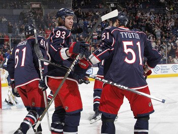 COLUMBUS, OH - MARCH 09:  Jakub Voracek #93 of the Columbus Blue Jackets celebrates his second-period goal with teammates Fedor Tyutin #51 and Rick Nash #61 while playing the St. Louis Blues on March 9, 2011 at Nationwide Arena in Columbus, Ohio.  (Photo