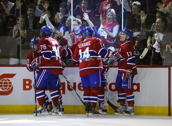 MONTREAL, CANADA - APRIL 26:  Brian Gionta #21, P.K. Subban #76, Tomas Plekanec #14, Scott Gomez #11 and Michael Cammalleri #13 of the Montreal Canadiens celebrate a goal against the Boston Bruins in Game Six of the Eastern Conference Quarterfinals during