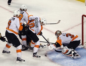 BOSTON, MA - MAY 06: Sean O'Donnell #6, Claude Giroux #28, Kris Versteeg #10, and Sergei Bobrovsky #35 of the Philadelphia Flyers defend the net against the Boston Bruins in Game Four of the Eastern Conference Semifinals during the 2011 NHL Stanley Cup Pl