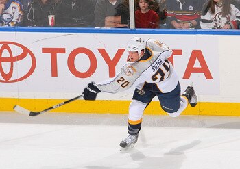 BUFFALO, NY - MARCH 20: Ryan Sutter #20  of the Nashville Predators shoots against the Buffalo Sabres  at HSBC Arena on March 20, 2011 in Buffalo, New York.  (Photo by Rick Stewart/Getty Images)