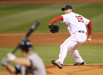 BOSTON, MA - APRIL 10: Josh Beckett #19 of the Boston Red Sox throws against the New York Yankees at Fenway Park April 10, 2011 in Boston, Massachusetts. (Photo by Jim Rogash/Getty Images)