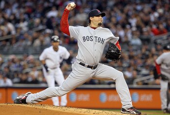 NEW YORK, NY - MAY 14:  Josh Beckett #19 of the Boston Red Sox delivers a pitch against the New York Yankees on May 14, 2011 at Yankee Stadium in the Bronx borough of New York City.  (Photo by Jim McIsaac/Getty Images)