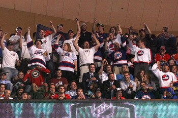 ST PAUL, MN - JUNE 24:  Winnipeg Jets hockey fans cheer on during day one of the 2011 NHL Entry Draft at Xcel Energy Center on June 24, 2011 in St Paul, Minnesota.  (Photo by Bruce Bennett/Getty Images)