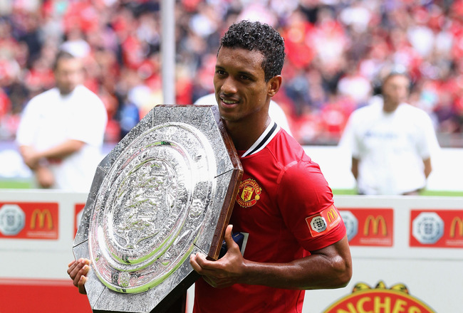 LONDON, ENGLAND - AUGUST 07:  Nani of Manchester United poses with the Community Shield after victory in the FA Community Shield match sponsored by McDonald's between Manchester City and Manchester United at Wembley Stadium on August 7, 2011 in London, En