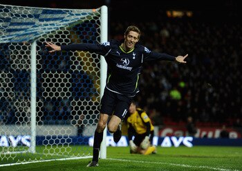 BLACKBURN, ENGLAND - FEBRUARY 02: Peter Crouch of Tottenham Hotspur celebrates scoring the opening goal during the Barclays Premier League match between Blackburn Rovers and Tottenham Hotspur at Ewood Park on February 2, 2011 in Blackburn, England.  (Phot
